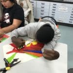 Student doing an artwork