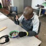 Student creating an artwork