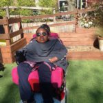 RH - activities - 2 girl in wheelchair sunbathing