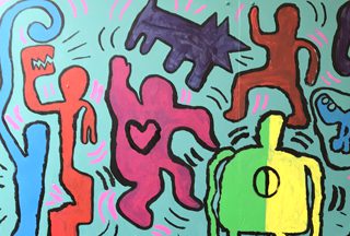 The mural in the playground painted by our students