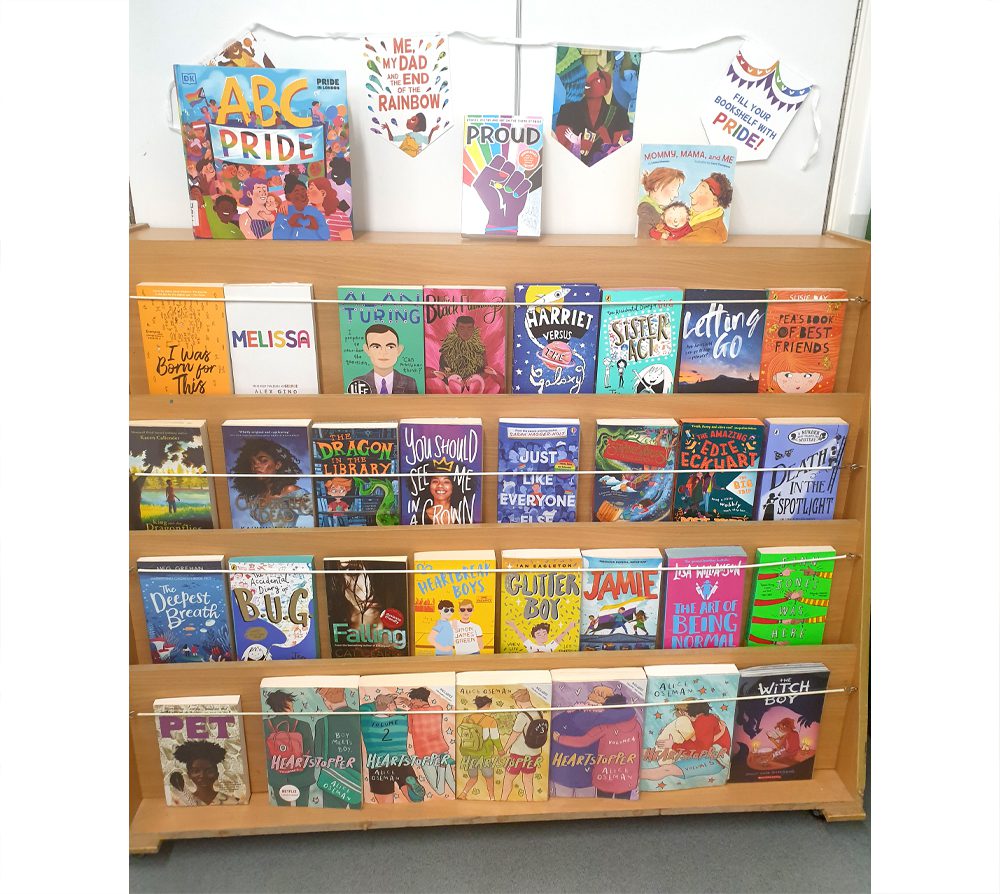 A library book display for Pride