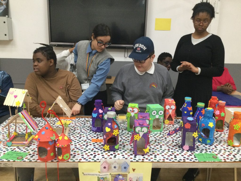 Students selling their creations at the Enterprise Project Fair