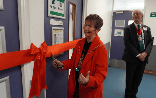 The Mayor of the Royal Borough of Greenwich Linda Bird cutting the ribbon watched on by Councillor David Gardner